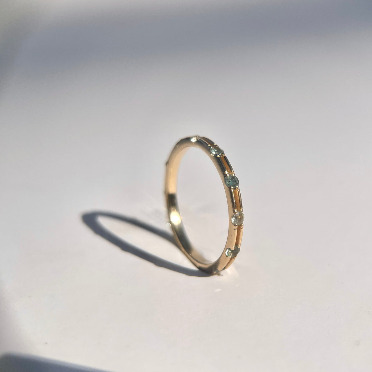 The Space Between Distanced Eternity band - Green Sapphire